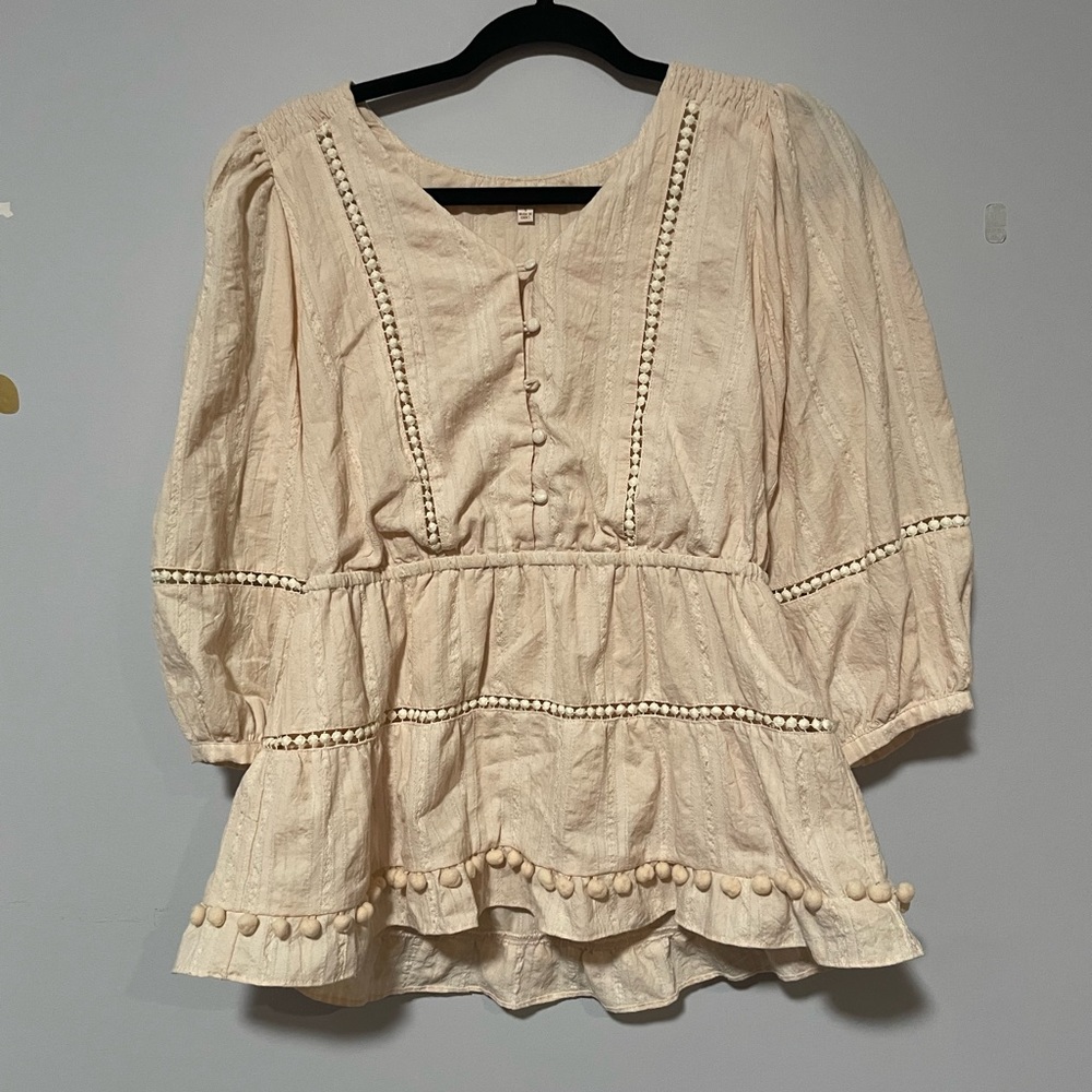 Pale pink blouse in women’s size small